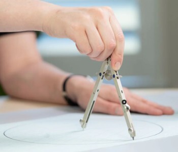 Drawing compass in use